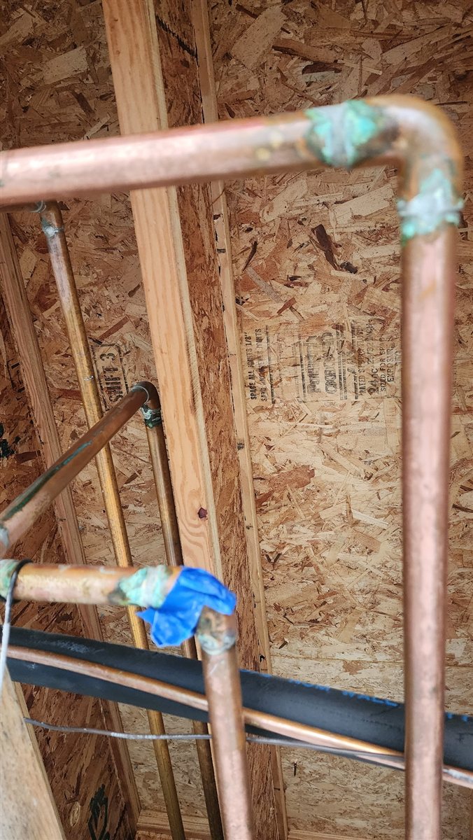 Corroded copper joints ahead of a repipe.