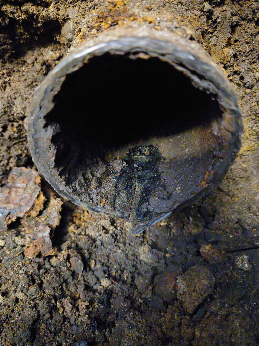 Corroded sewer pipe.