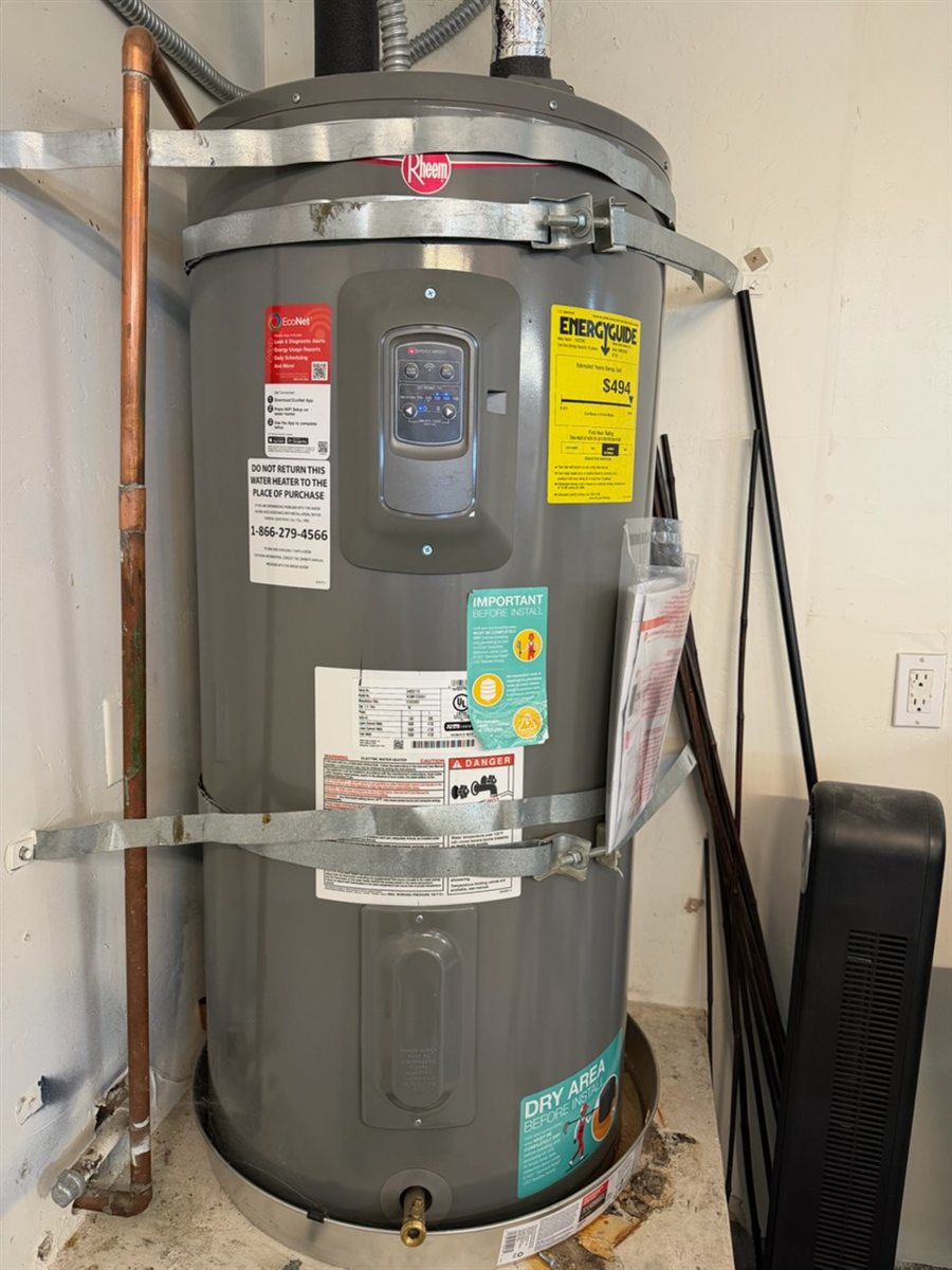 Electric water heater installed.