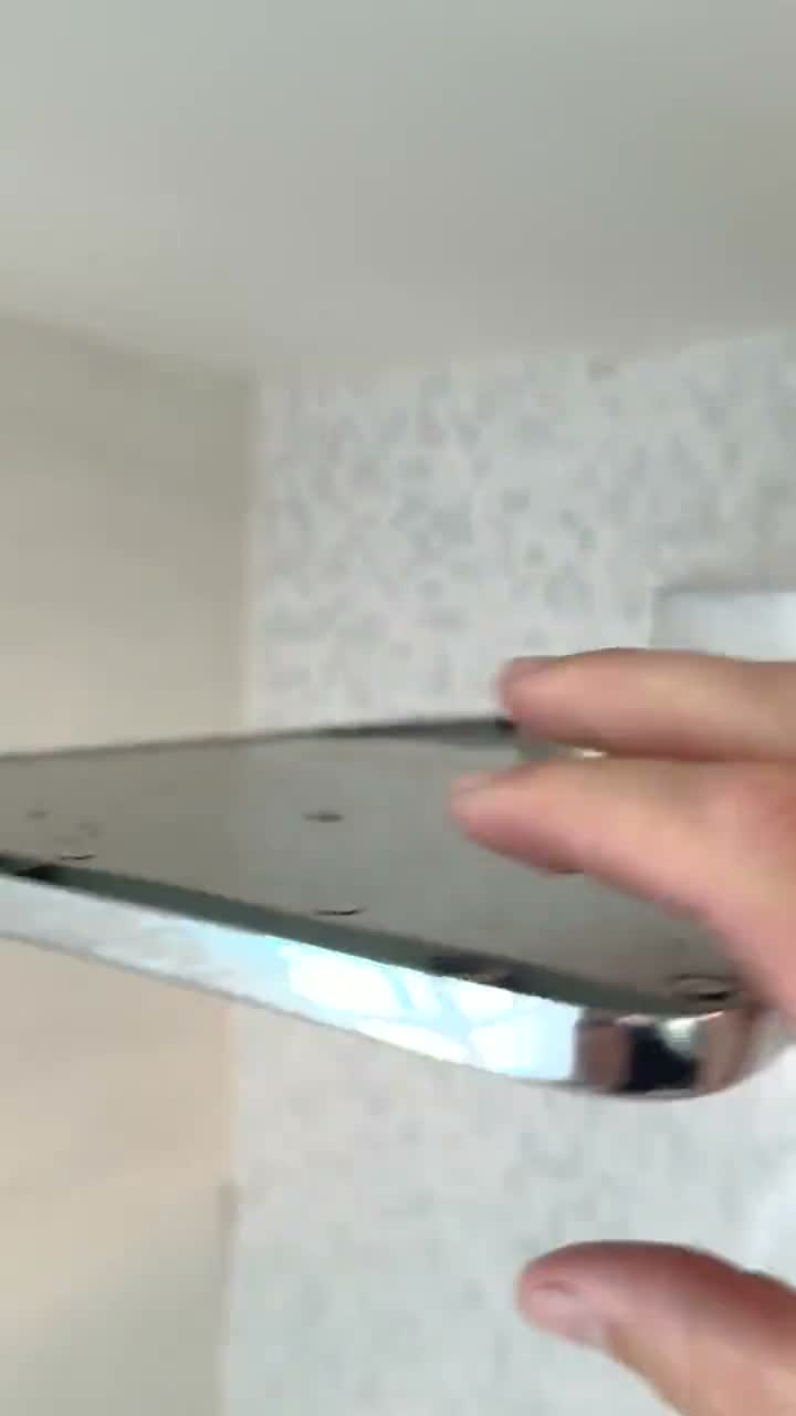 Servicing a shower fixture panel, live job footage.